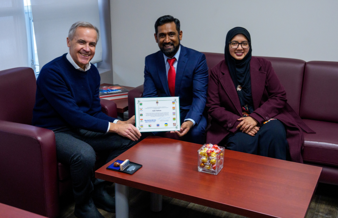 MP Mark Carney Meets with New Citizens in Nepean and Presents Citizenship Greeting Certificate